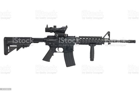 M4 Carbine With Acog Optic And A Foregrip Isolated Stock Photo