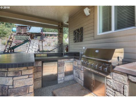 Thinking about building an outdoor kitchen at home? Outdoor Kitchens in Today's Luxury Homes - OR & WA ...