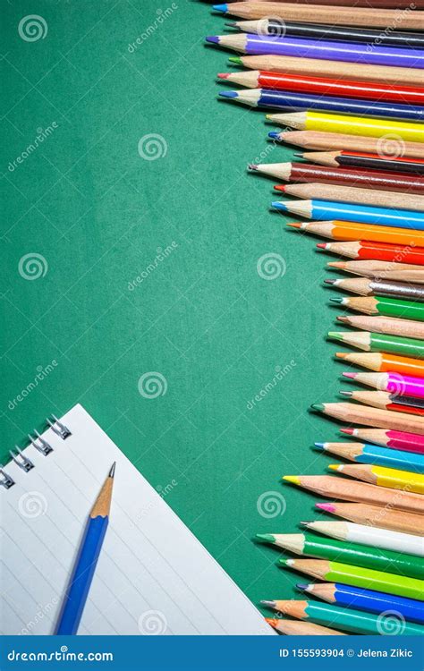 Colorful Pencils Over Green Chalkboard Stock Photo Image Of
