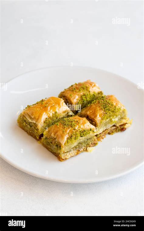 Pistachio Baklava Dessert On A White Background Turkish Sweet Dessert