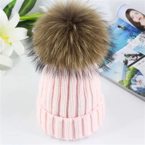 New High Quality 15cm Real Raccoon Pom Pom Beanie Cap Winter Hat For Women New Female Thick