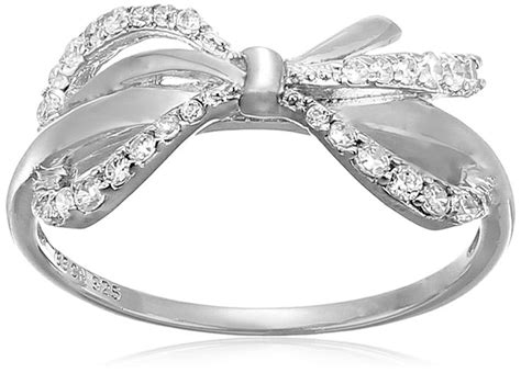 A White Gold Bow Ring With Diamonds