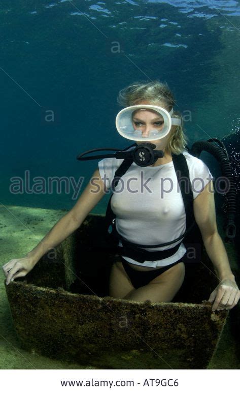 Woman Scuba Diver In Jacqueline Bisset Like Pose On Shipwreck Masked