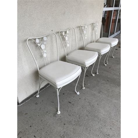 With wrought iron mesh backs and seats, and subtly curved legs, constantine always brings consistent style. Vintage Woodard Wrought Iron Patio Chairs - Daisy Floral ...