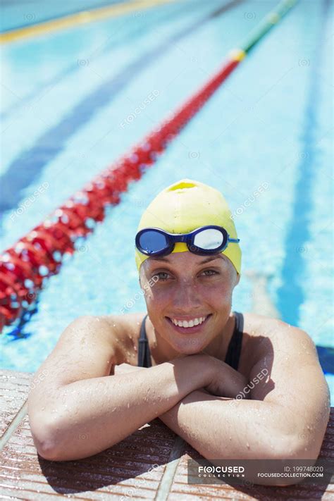 Portrait Of Smiling Swimmer Leaning At Edge Of Pool — Swim Meet Sunny