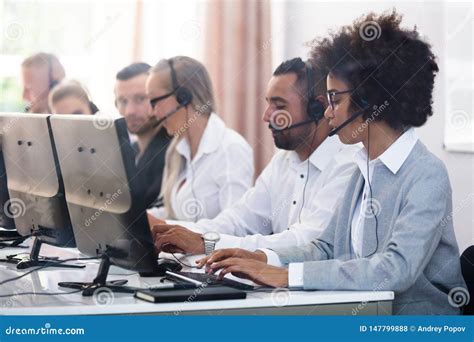 Customer Service Executives Working In Call Center Stock Photo Image