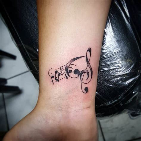 Best small music tattoos and designs. 20+ Small Wrist Tattoos | Tattoo Designs | Design Trends - Premium PSD, Vector Downloads
