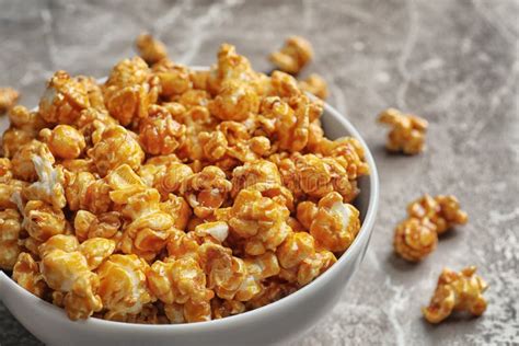 Delicious Popcorn With Caramel In Bowl On Table Stock Photo Image Of