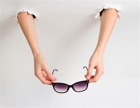 Premium Photo Female Hands Holding Glasses