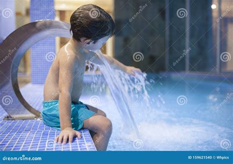 4 Years Boy Playing With Jets At Indoor Pool Spa Stock Photo Image Of
