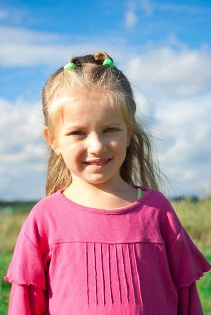 Premium Photo Portrait Of Beautiful Little Girl In A Meadow