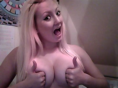 Topless Girl Posing In Her Room With Hands Covering Her Boobs Porn Pic