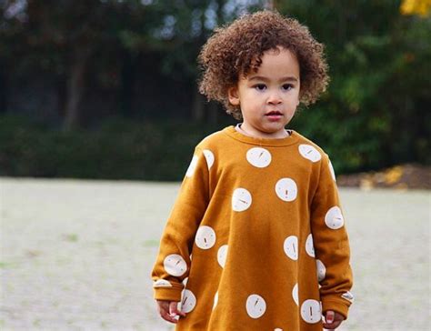 Cute Light Skin Baby Girl With Curly Hair