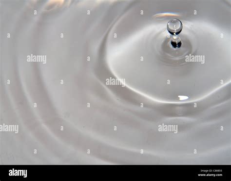 Water Droplet Hitting Surface Of Water Stock Photo Alamy