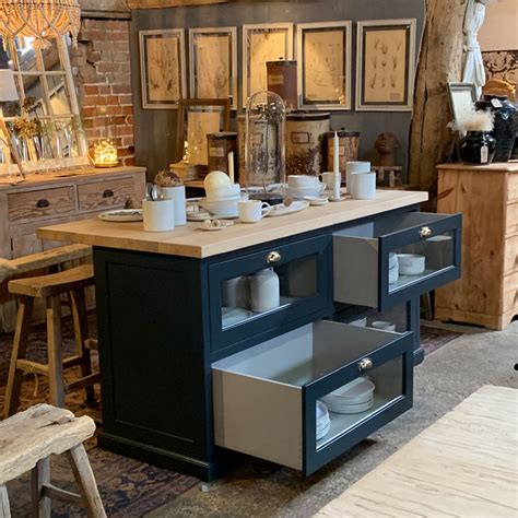 At a minimum, an island adds counter and storage space just where you need them: freestanding kitchen island with haberdashery drawers ...