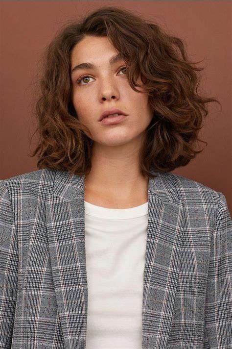 If you are gifted with curls, you can still experiment with layered hairstyles. Pin on curly short hair
