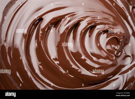 Melted Chocolate Swirl Background Glossy Splash Of Chocolate Texture