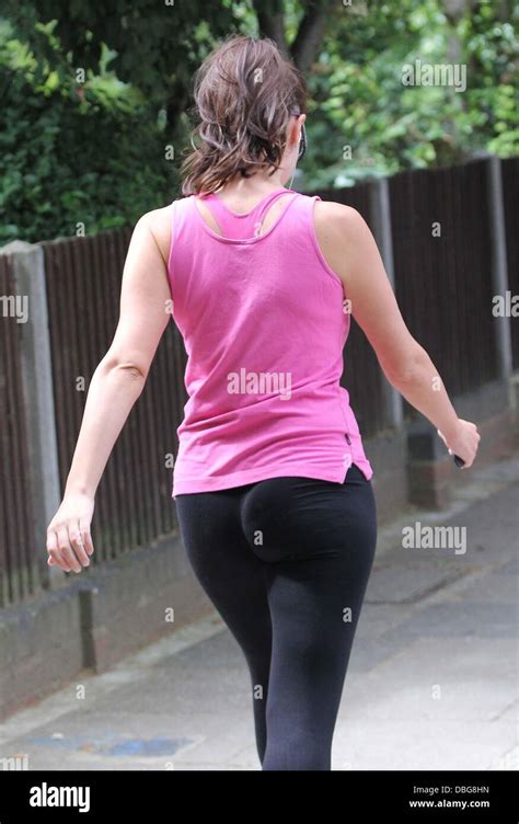 Imogen Thomas Goes For A Run Wearing Leggings And A Pink Vest Top