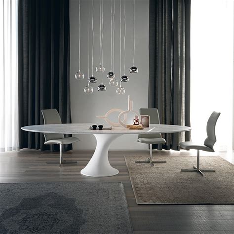 Dining Table Inspired By The Form Of Iconic Tulip Table Decoist