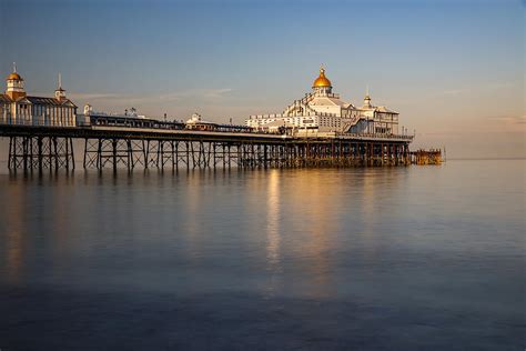 Eastbourne Pier In England Seen At Sunset Photograph By George