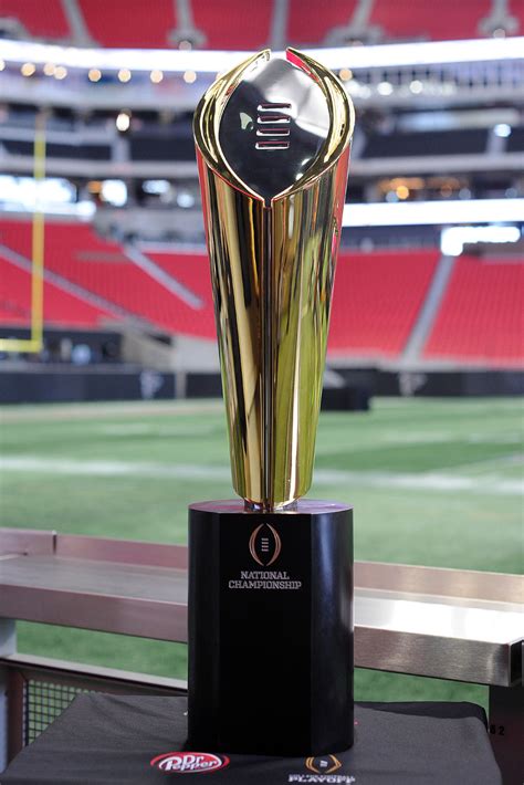 In this system, a competitor has to challenge the current champion to win the championship. National Championship Trophy in Gwinnett today | News | gwinnettdailypost.com