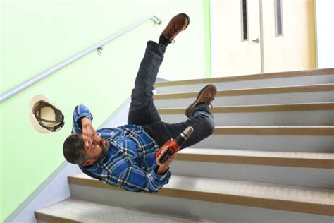 4000 Person Falling Down Stairs Stock Photos Pictures And Royalty Free