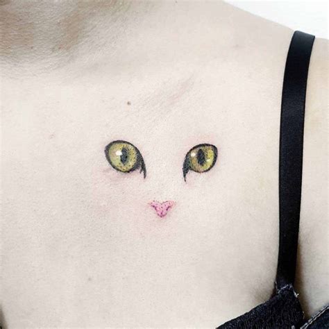 Cat tattoos that will make you purr with joy! Cat Eyes Tattoo on Collar Bone | Best Tattoo Ideas Gallery