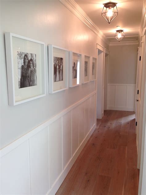 Ikea white Ribba frames in hallway gallery wall with board and batten | Gallery wall living room ...