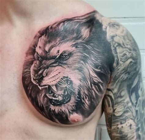 Roar With Style Lion Face Chest Tattoo Ideas For Brave Hearts