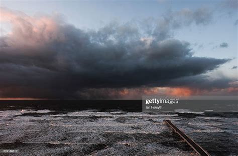 A Dark Storm And Hail Cloud Approaches The North Sea Coastline On