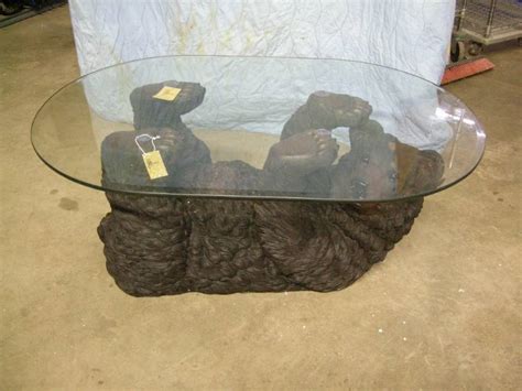 It has an oval glass top, the base is made from plaster. Bear Coffee Table | More Country, Cabin, and Cowboy Decor ...