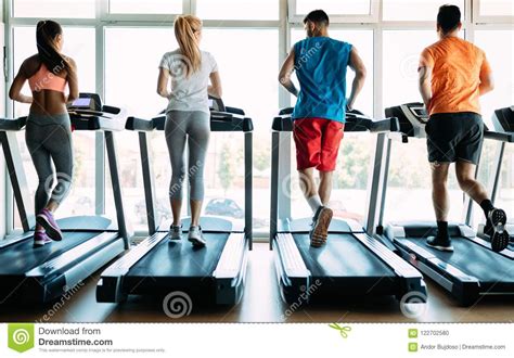 Find the perfect people running race stock photos and editorial news pictures from getty images. Picture Of People Running On Treadmill In Gym Stock Photo ...