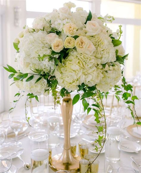 Create a truly memorable look with wedding reception centerpieces from oriental trading. White and green centerpiece | Green centerpieces, Wedding ...