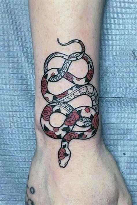 Snake tattoos for girls, men & women. lower back cover up tattoos #Lowerbacktattoos | Tattoos, Snake tattoo ideas, Body art tattoos