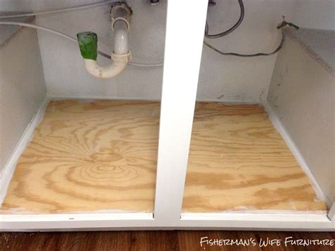 Take the time to install the kitchen floor everywhere except under the cabinets. Kitchen Sink Cabinet Floor Replacement in 2020 | Under kitchen sinks, Sink cabinet, Replacing ...
