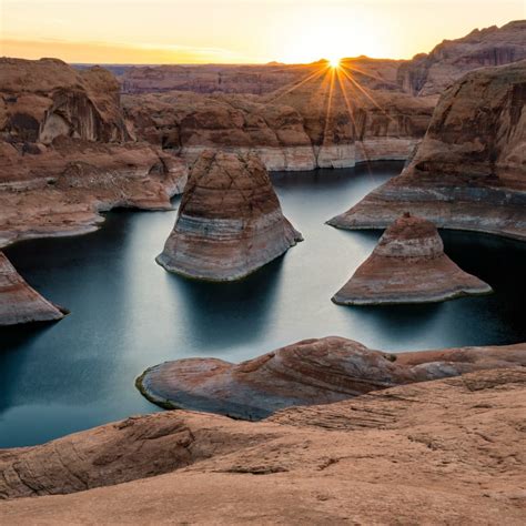 getting a sunrise photo of reflection canyon at glen canyon national recreation area in utah is