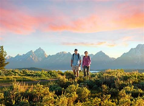 Outside on the concrete patio there is a fire ring/grilling area,. Colter Bay Village | Grand Teton National Park