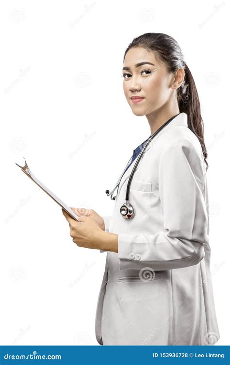 Asian Woman Doctor In A White Lab Coat And Stethoscope Holding