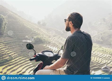 Bearded Young Man On Red Motorcycle Overlooking Rice Terraces Of Sapa ...