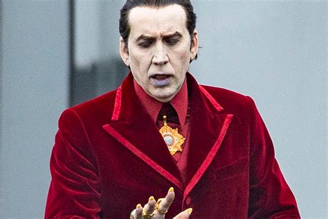 Nicolas Cage Looks Totally Unrecognizable With Pale Skin And Purple Lips