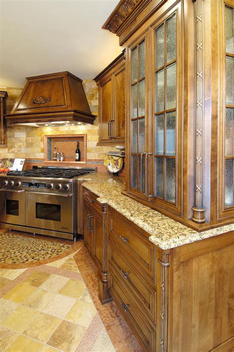 Stunning Mediterranean Kitchen With Carved Wood Cabinets Hgtv