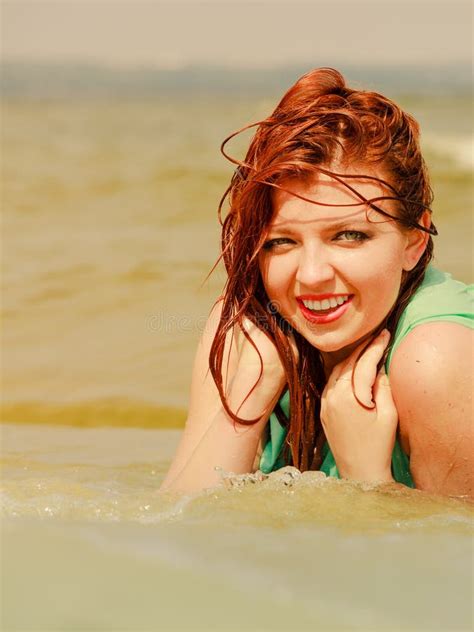Redhead Woman Posing In Water During Summertime Stock Photo Image Of