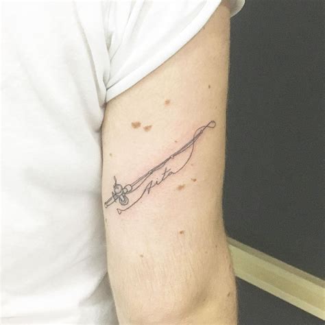I love this fish design that has a great image and some stunning colors. UPDATED: 45 Alluring Fishing Tattoos (August 2020)