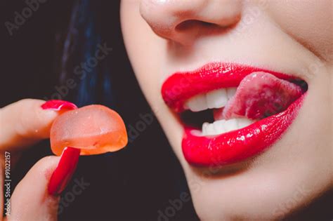 Beautiful Woman Licking Her Red Lips Before Tasting Jelly Sweet Stock