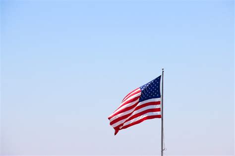 Free Stock Photo Of American Flag Waving In Clear Sky