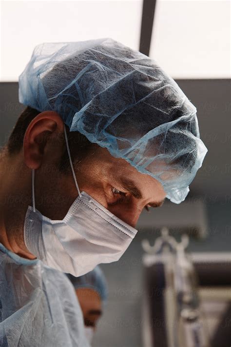 Concentrated Surgeon Man In Hospital Del Colaborador De Stocksy Danil Nevsky Stocksy