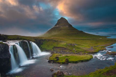 Waterfall Kirkjufellsfoss And Kirkjufell Mountain In The South West