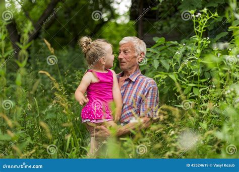 Grandfather With His Granddaughter Stock Image Image Of Outdoor