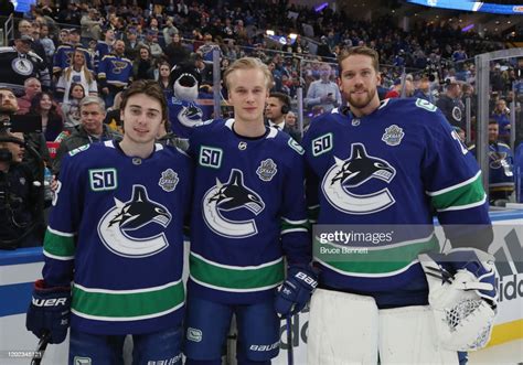 Quinn Hughes Elias Pettersson And Jacob Markstrom Of The Vancouver