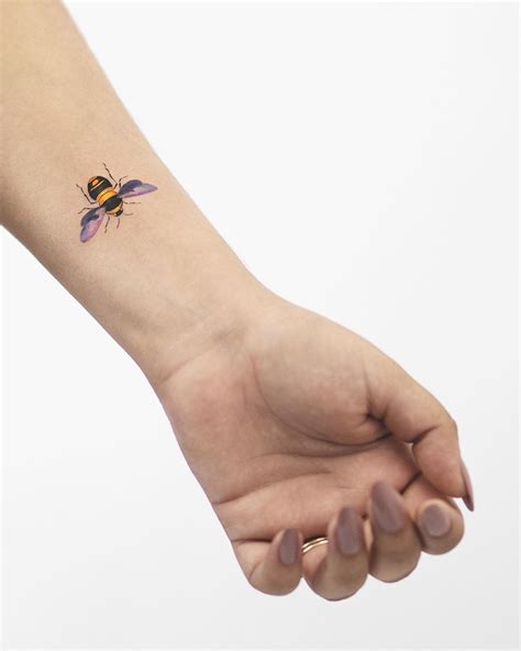 Bee Tattoo On A Wrist By Rey Jasper